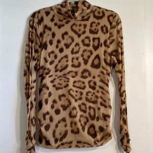 **Sold**Women’s Leopard Print Sheer Size XL Long Sleeves